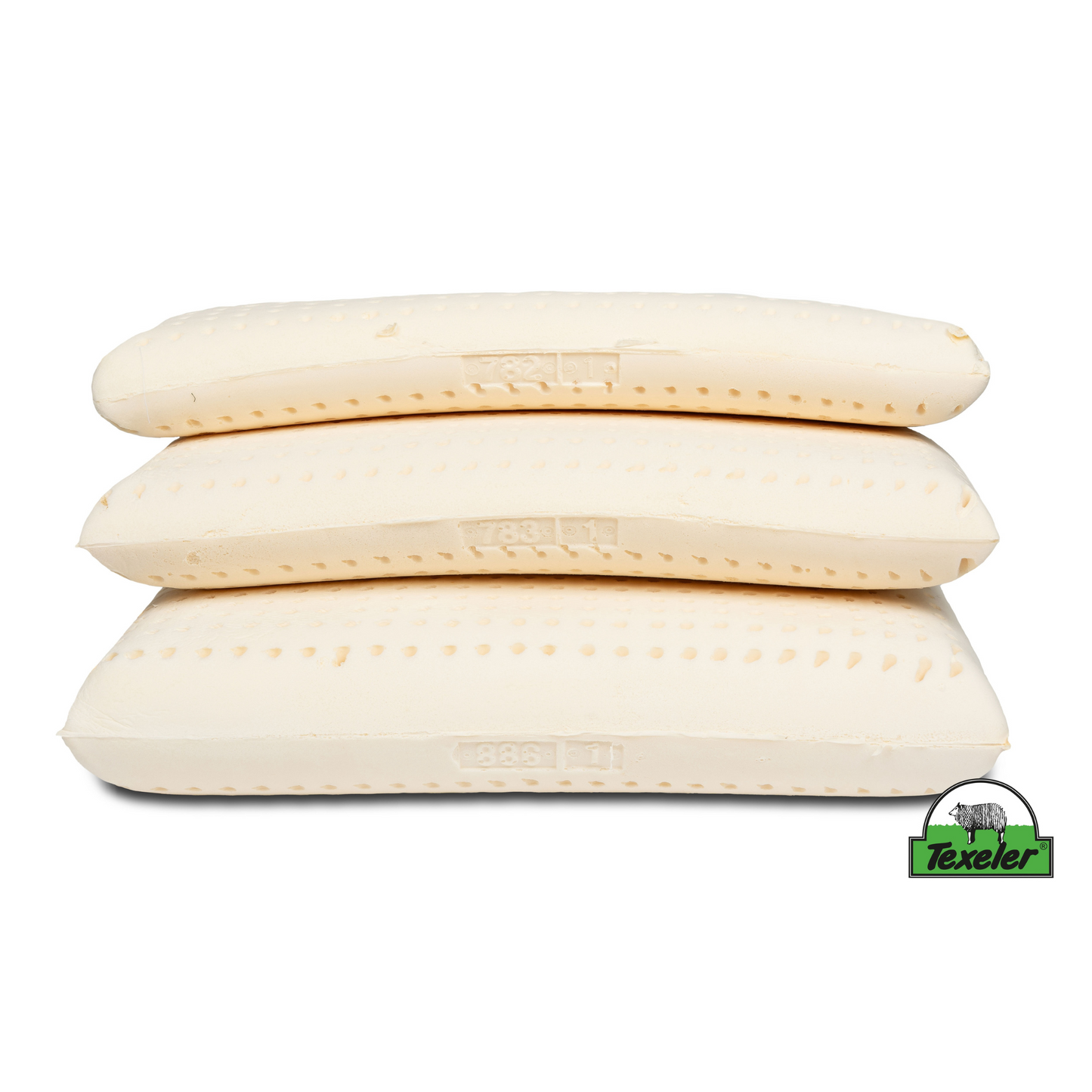 The latex cores in three different sizes stacked on top of each other with the smallest on top.product name texeler soezz supple wool pillow