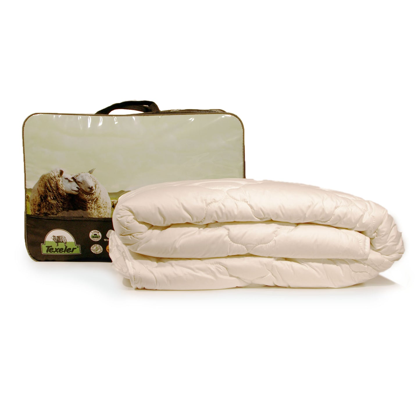 A beige Texeler Multi Choice comforter displayed in front of its packaging, which features an image of sheep on a green landscape. The comforter appears to be made of cotton and wool. 400 gram 