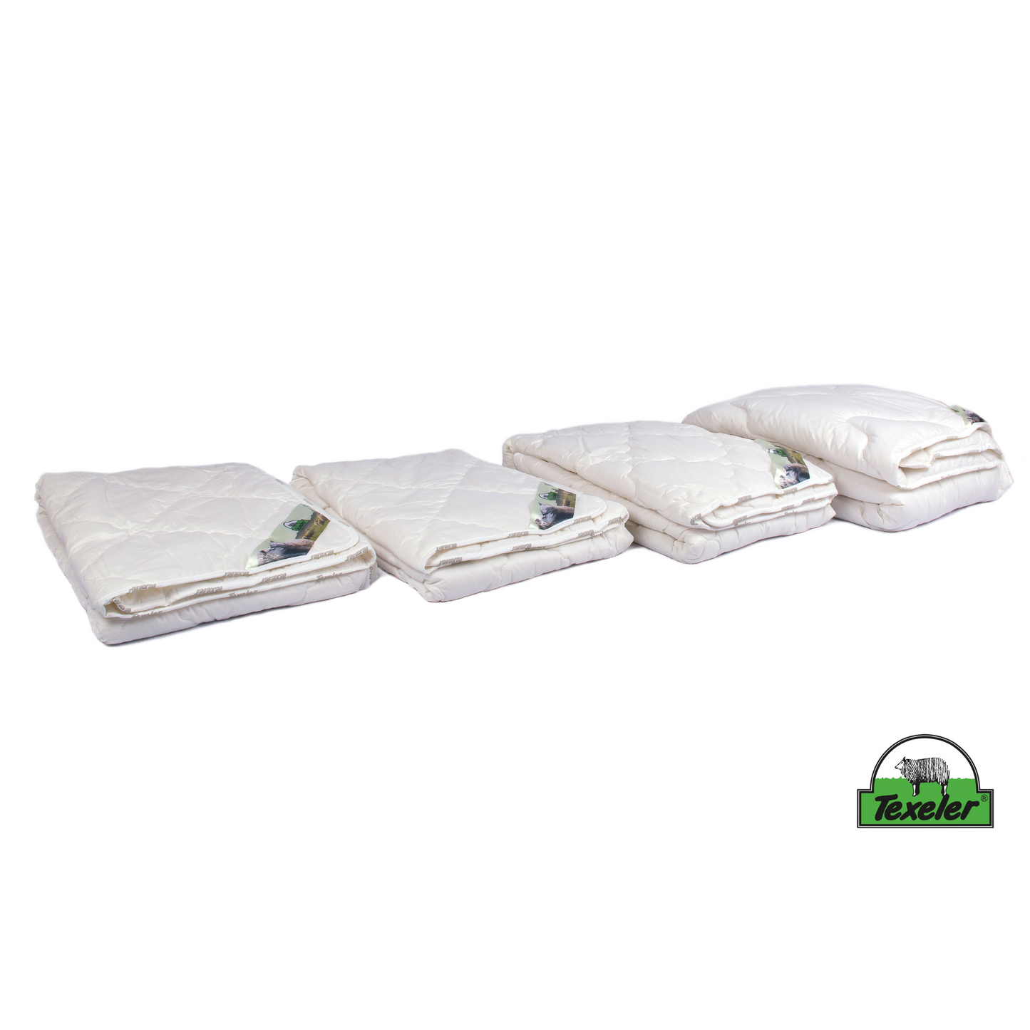 The four comforters laid next to eachother from lighters on the left and heaviest on the right. brand name texeler