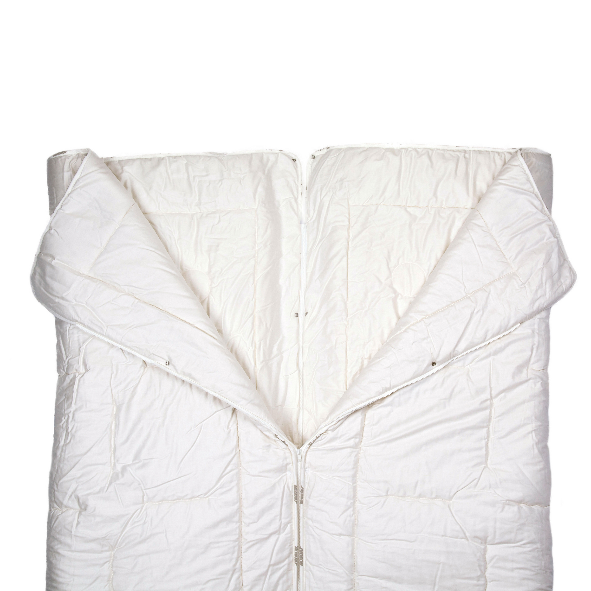 The texeler satin partner wool comforter laying flat while the zipper is undone in the middle to show the function of the comforter. Angle from above.