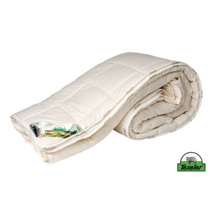 Rolled up Texeler wonderwool comforter. white background